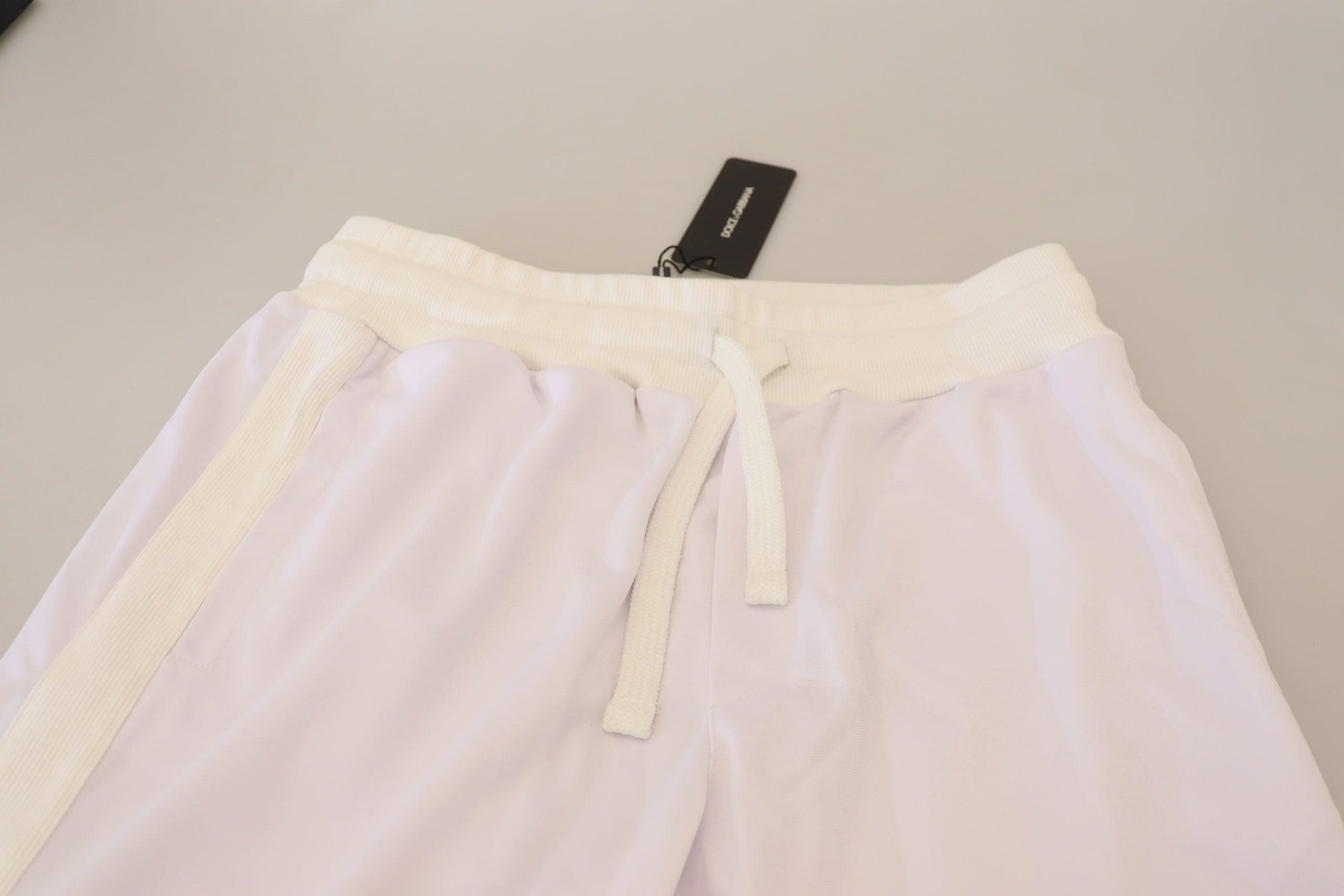 Dolce & Gabbana Elegant White Jogger Pants for Sophisticated Comfort - Arichezz.store